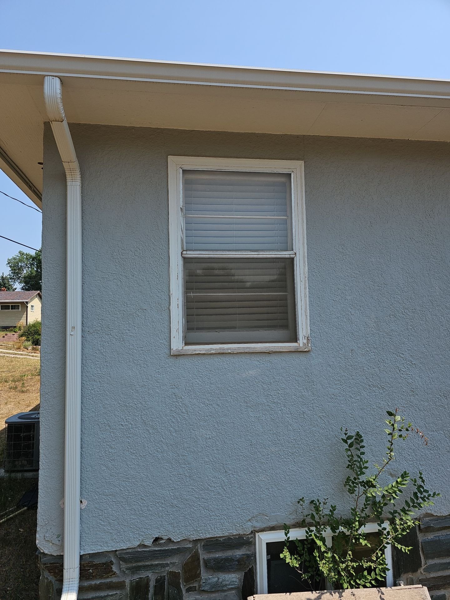 Before: original aging window and exterior trim