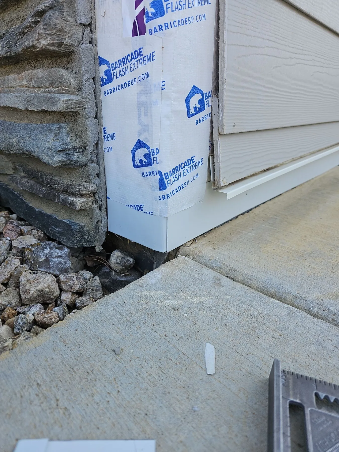 Flashing and weather-resistive barrier detail during repair